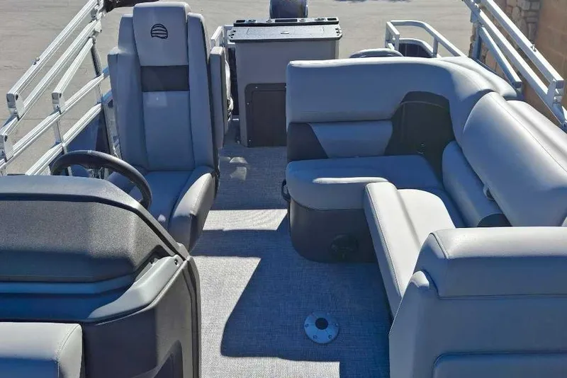 Slide: The Image of 2026 Sun Tracker SportFish 20 DLX interior with plush seating and modern design. - 80