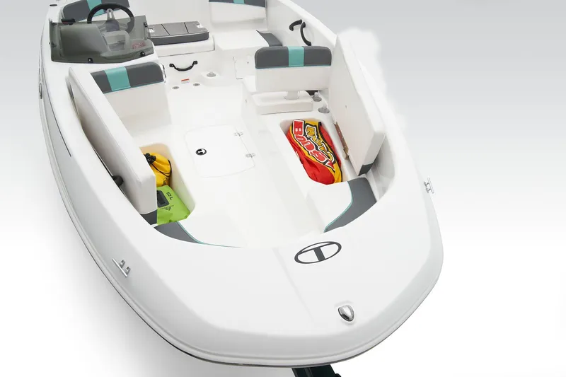 Slide: The Image of 2026 Tahoe T16 boat interior with sleek seating and modern design. - 11