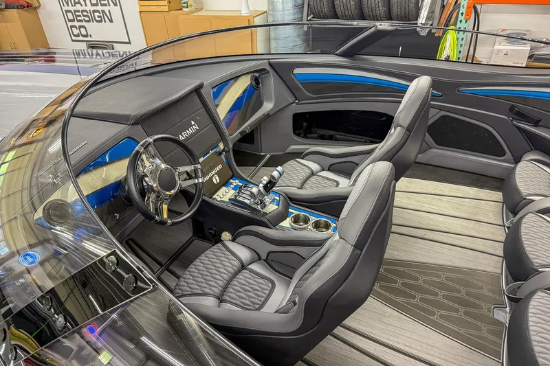 Slide: The Image of Interior of 2019 MTI 340X boat with modern design and advanced controls. - 5