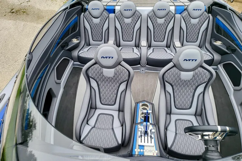 Slide: The Image of Luxurious interior of 2019 MTI 340X boat with stylish seating and modern controls. - 7