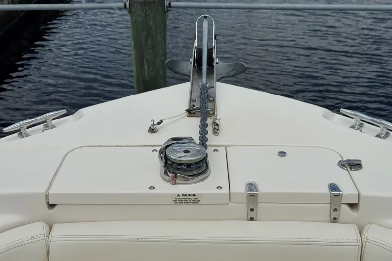 Slide: The Image of 2015 Grady-White Fisherman 257 boat bow with anchor and chain mechanism. - 26