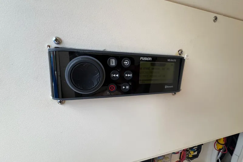 Slide: The Image of Fusion MS-RA70 stereo system on 2015 Grady-White Fisherman 257 boat dashboard. - 27