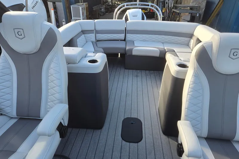 Slide: The Image of 2026 Godfrey Monaco 235 ULC interior with luxurious seating and modern design. - 11