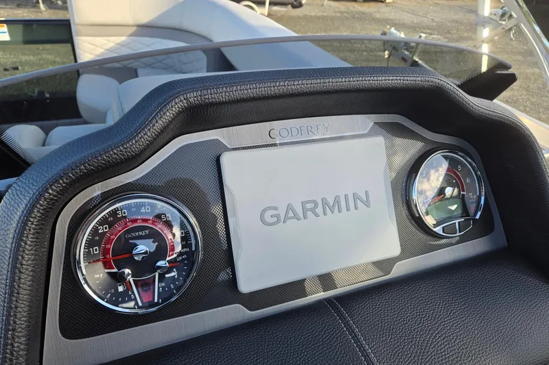 Slide: The Image of Dashboard of 2026 Godfrey Monaco 235 ULC with Garmin display and gauges. - 15