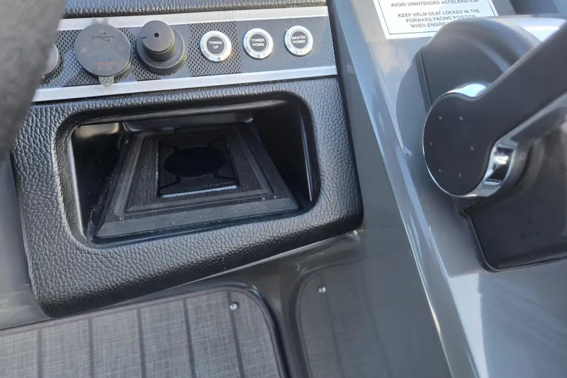 Slide: The Image of Control panel of 2026 Godfrey Monaco 235 ULC boat with buttons and throttle lever. - 17