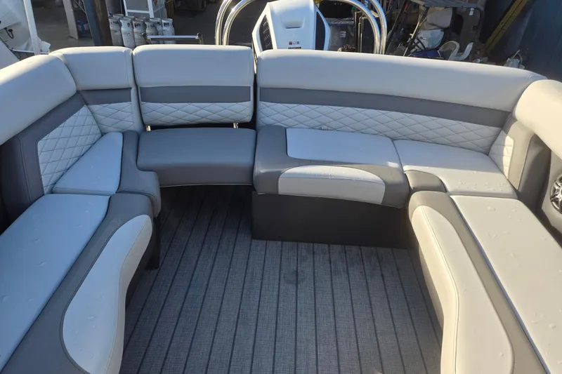 Slide: The Image of Luxurious seating on 2026 Godfrey Monaco 235 ULC pontoon boat, featuring elegant upholstery. - 20