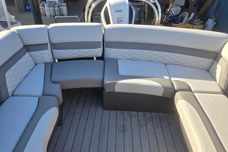 Slide: The Image of Luxurious seating on 2026 Godfrey Monaco 235 ULC pontoon boat, featuring elegant upholstery. - 22