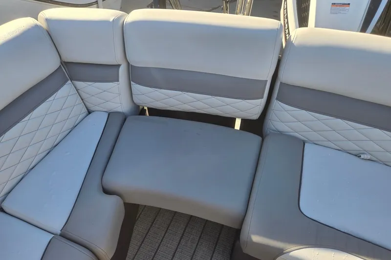 Slide: The Image of Luxurious seating on 2026 Godfrey Monaco 235 ULC boat, featuring quilted upholstery. - 24