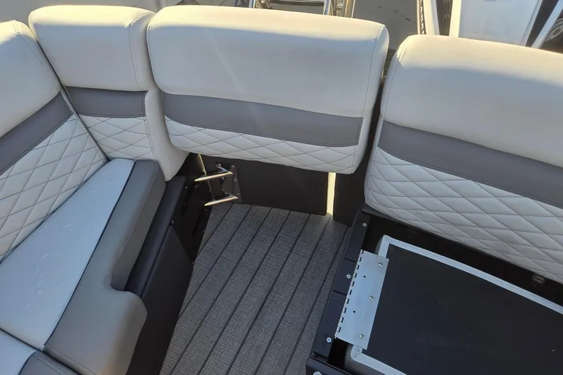 Slide: The Image of Luxurious seating on 2026 Godfrey Monaco 235 ULC pontoon boat, featuring quilted upholstery. - 25