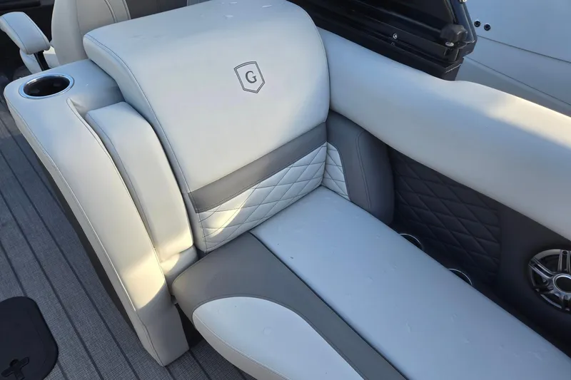 Slide: The Image of Luxurious seating on 2026 Godfrey Monaco 235 ULC boat, featuring elegant quilted upholstery. - 32