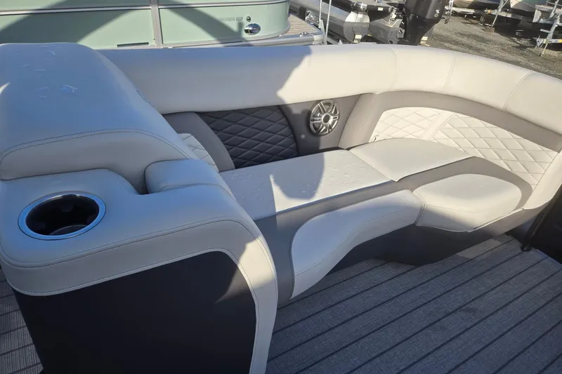 Slide: The Image of Luxurious seating on 2026 Godfrey Monaco 235 ULC pontoon boat with cup holder and speaker. - 38