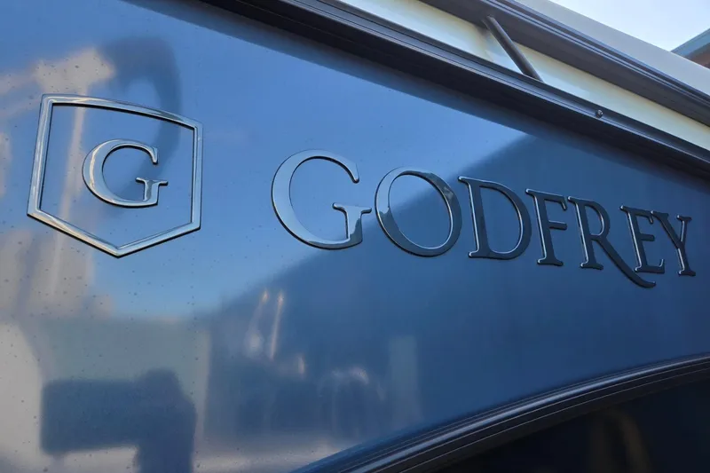 Slide: The Image of Close-up of 2026 Godfrey Monaco 235 ULC logo on blue surface. - 41