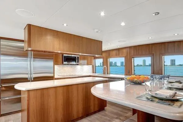 Slide: The Image of Luxurious kitchen interior of 2005 Hatteras 100 Motor Yacht with ocean view. - 16