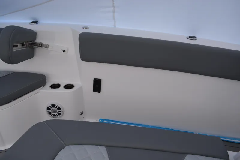 Slide: The Image of 2026 NauticStar 332 Offshore boat interior with modern seating and canopy. - 16