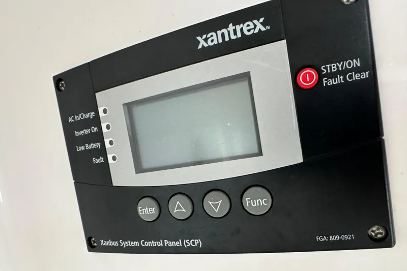 Slide: The Image of Xantrex control panel on 2020 Southport 33DC, featuring buttons and status indicators. - 24