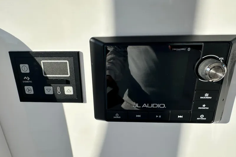 Slide: The Image of Control panel and JL Audio system on 2020 Southport 33DC boat. - 25