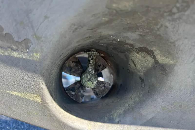 Slide: The Image of Close-up of a 2020 Southport 33DC boat thruster with visible wear. - 35