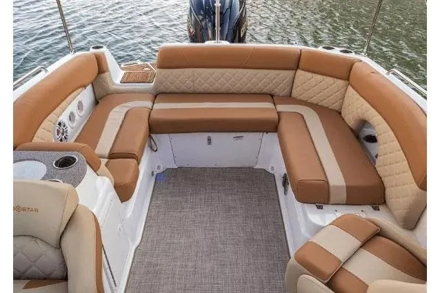Slide: The Image of 2026 NauticStar 243 DC Deck boat with sleek design and spacious seating. - 10