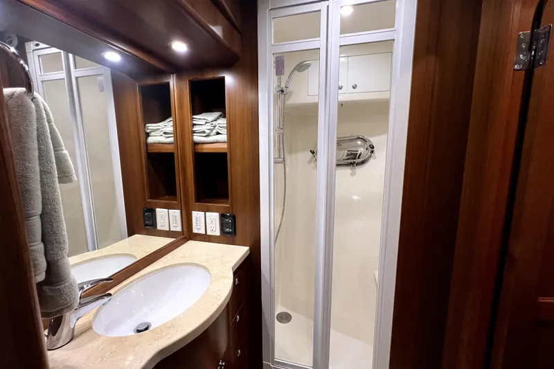 Slide: The Image of Luxurious bathroom in 2011 Nordhavn 60 yacht with shower and vanity. - 23