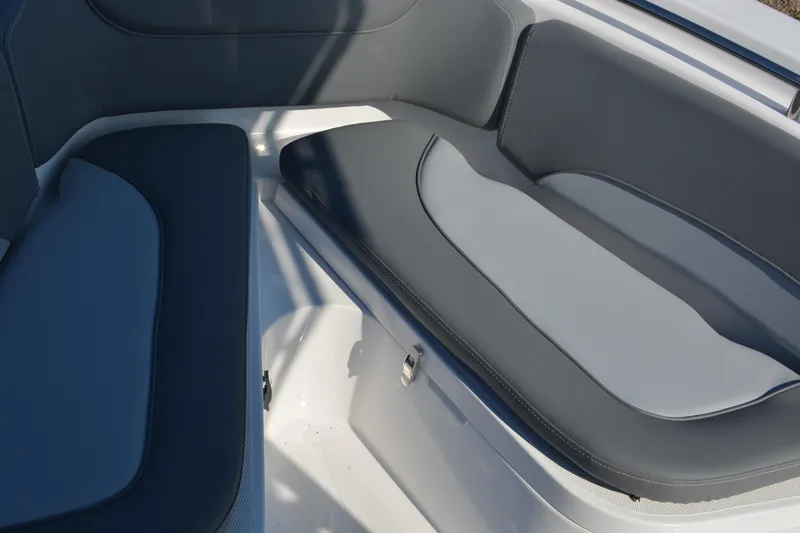 Slide: The Image of 2026 NauticStar 212 Legacy boat interior seating, featuring sleek gray upholstery. - 20