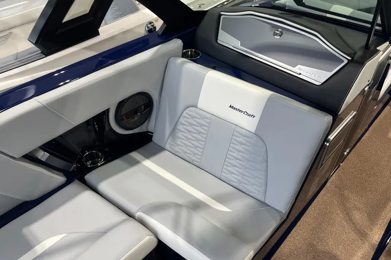 Slide: The Image of 2025 MasterCraft X24 boat interior with luxurious seating and modern design. - 8