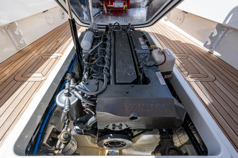 Slide: The Image of Engine compartment of a 2003 Hinckley Talaria 29 Center Console boat with Yanmar engine. - 12
