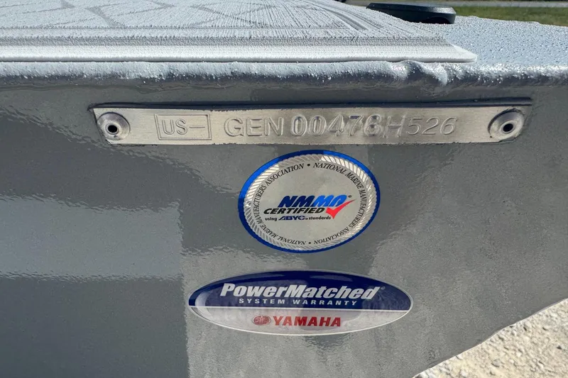 Slide: The Image of 2026 G3 21GX boat with certification and warranty labels, featuring Yamaha PowerMatched system. - 12