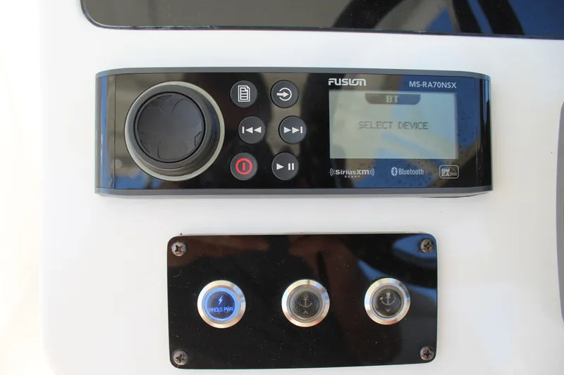 Slide: The Image of Fusion MS-RA70NSX stereo system on 2020 Edgewater 248CX Crossover boat dashboard. - 27