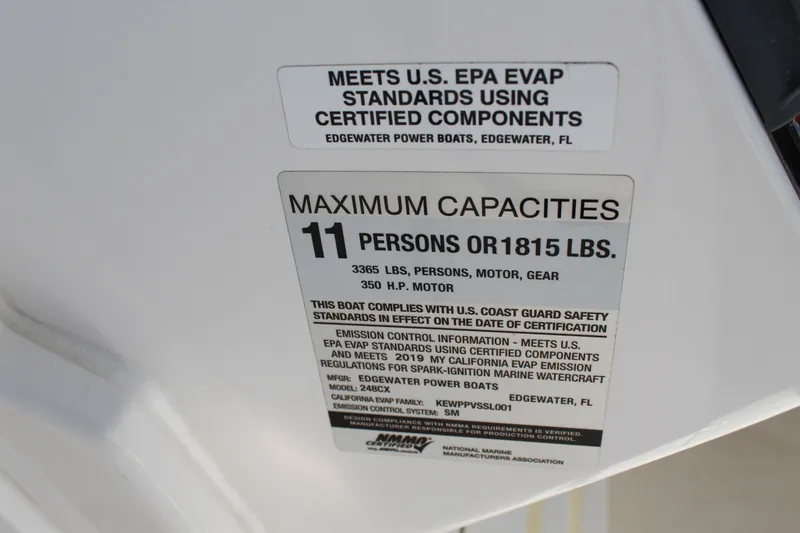 Slide: The Image of Edgewater 248CX Crossover 2020 capacity label: 11 persons or 1815 lbs, EPA compliant. - 38