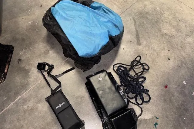 Slide: The Image of Yamaha WaveRunner VX Cruiser HO 2018 accessories on concrete floor, including cover and straps. - 11