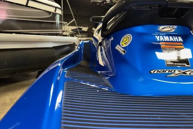 Slide: The Image of 2018 Yamaha WaveRunner VX Cruiser HO in a garage, showcasing sleek blue design. - 7