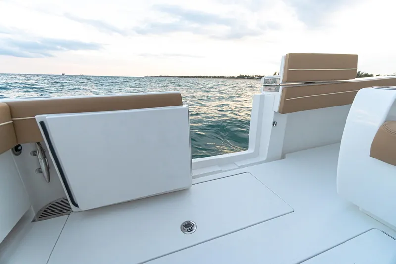 Slide: The Image of 2026 Valhalla Boatworks V-37 interior with ocean view, featuring sleek seating and modern design. - 21