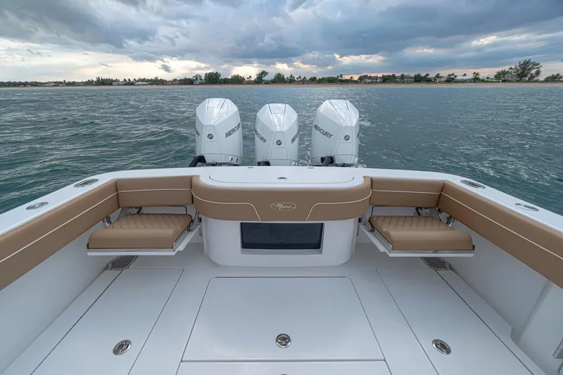 Slide: The Image of 2026 Valhalla Boatworks V-37 with triple Mercury engines on open water. - 23