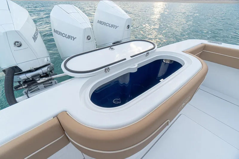 Slide: The Image of 2026 Valhalla Boatworks V-37 with Mercury engines, featuring a sleek livewell on deck. - 26