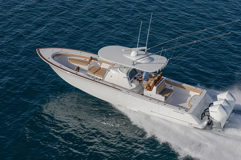 Slide: The Image of 2026 Valhalla Boatworks V-37 cruising on open water, showcasing sleek design and powerful engines. - 3