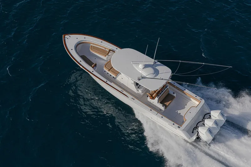 Slide: The Image of 2026 Valhalla Boatworks V-37 cruising on open water, aerial view. - 4