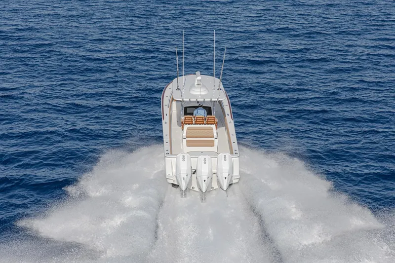 Slide: The Image of 2026 Valhalla Boatworks V-37 cruising on open ocean, showcasing powerful engines. - 5
