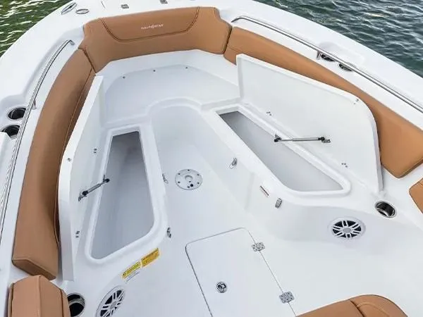 Slide: The Image of 2026 NauticStar 252 Legacy boat with dual 200 horsepower engines in showroom. - 5