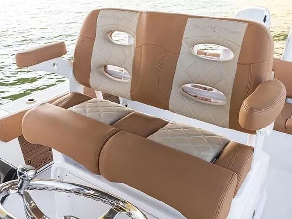 Slide: The Image of 2026 NauticStar 252 Legacy boat dashboard with steering wheel and control panel. - 7