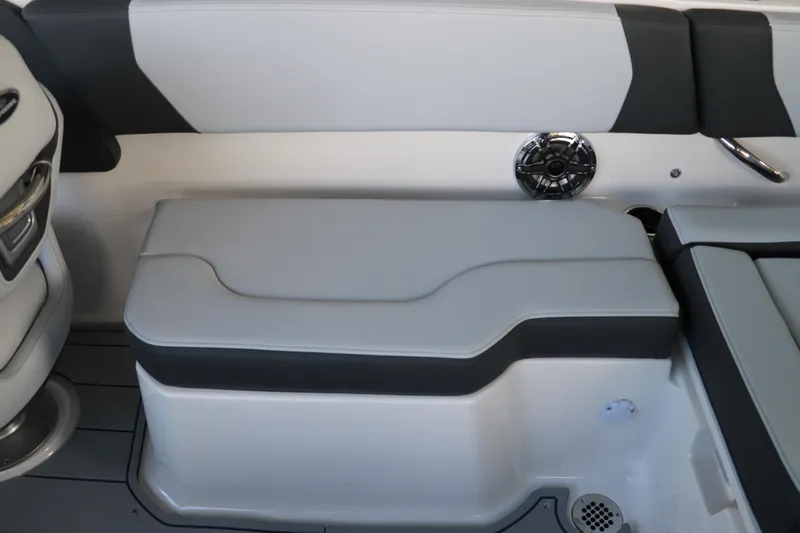 Slide: The Image of 2026 Chaparral 250 OSX boat interior seating with speaker and modern design. - 17