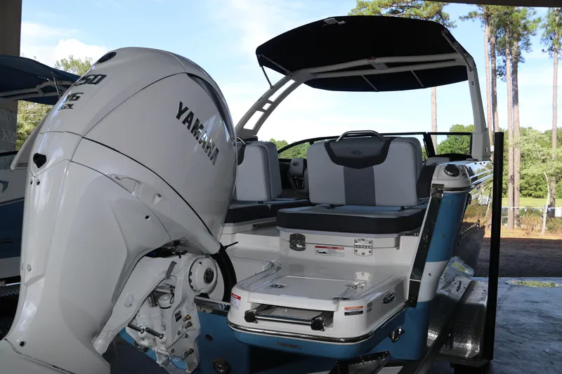 Slide: The Image of 2026 Chaparral 250 OSX boat with Yamaha engine, featuring sleek design and modern seating. - 3