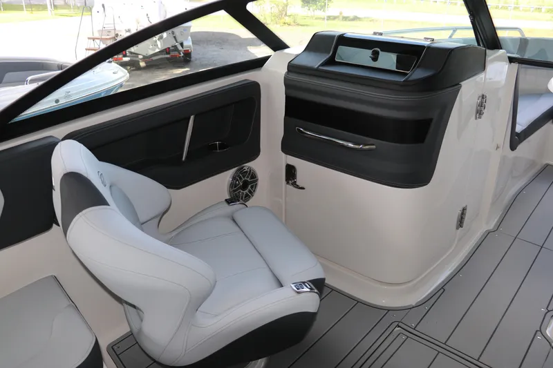 Slide: The Image of Interior of 2026 Chaparral 250 OSX boat with modern seating and sleek design. - 40
