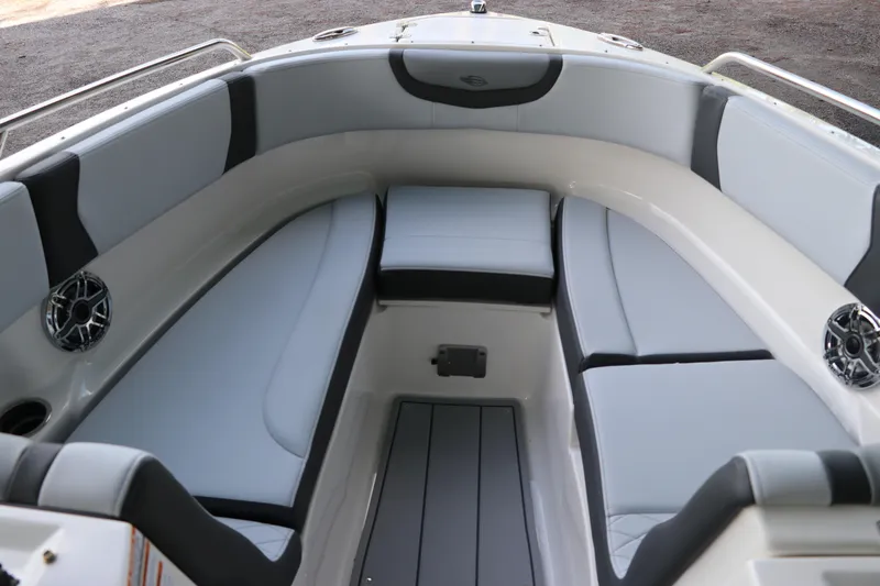 Slide: The Image of Interior view of 2026 Chaparral 250 OSX boat, featuring sleek seating and modern design. - 53