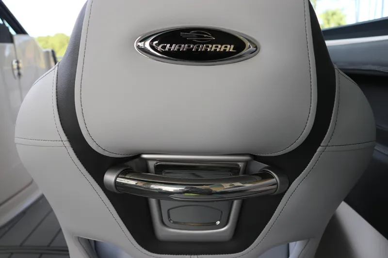 Slide: The Image of 2026 Chaparral 250 OSX boat seat with logo and sleek design. - 63
