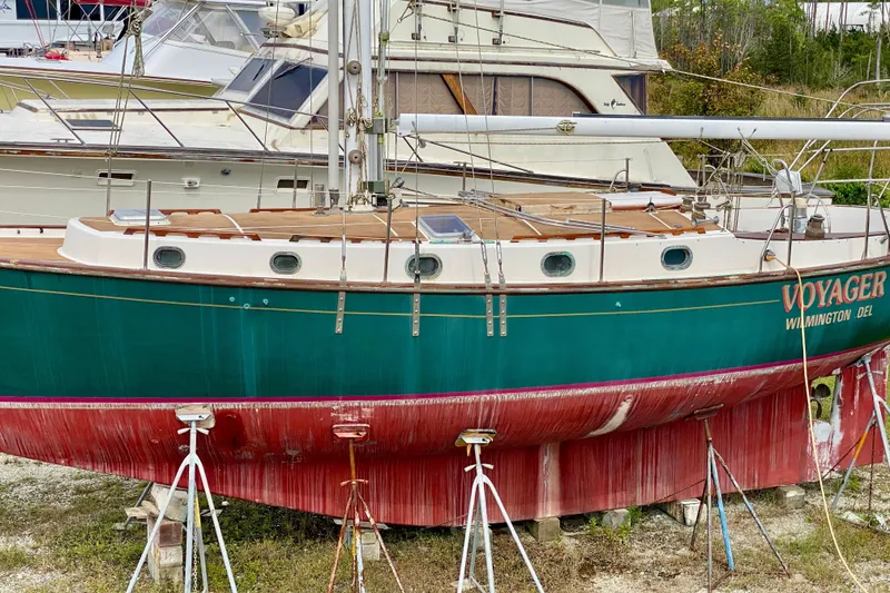 Slide: The Image of 1983 Liberty 38 Cutter sailboat "Voyager" on stands, Wilmington, Delaware. - 2