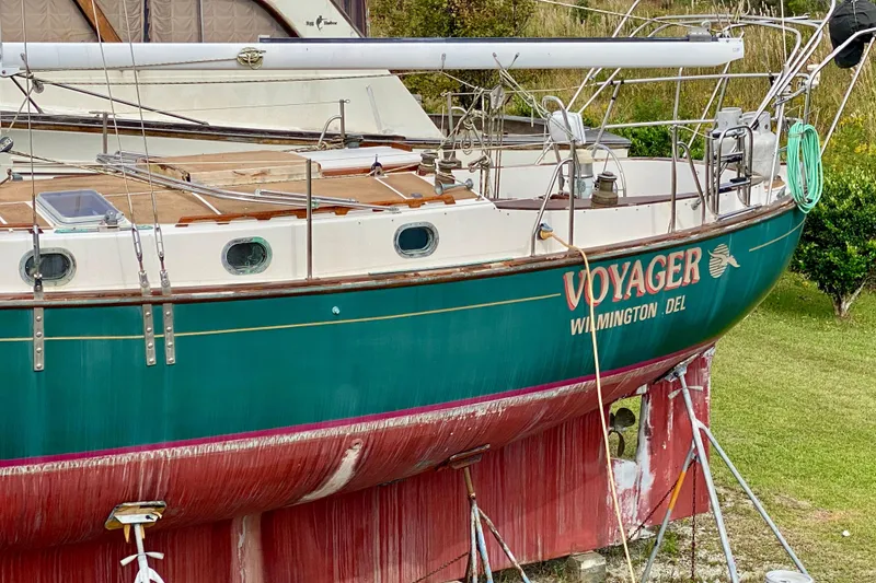 Slide: The Image of 1983 Liberty 38 Cutter sailboat "Voyager" on land, Wilmington, Delaware. - 3