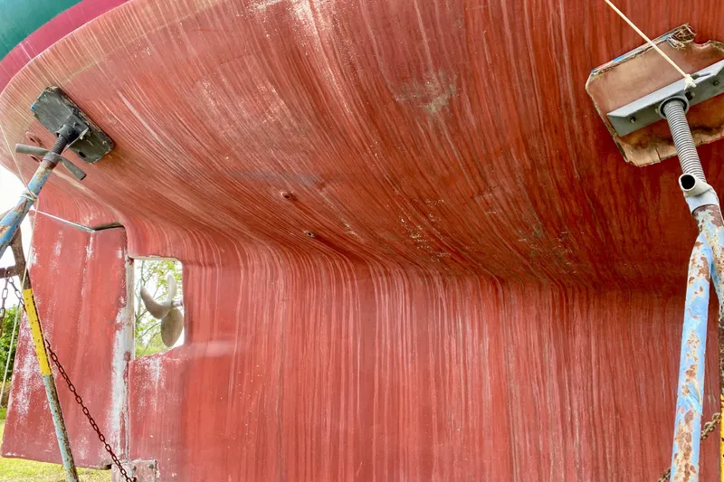 Slide: The Image of Bottom view of 1983 Liberty 38 Cutter sailboat hull on stands. - 43