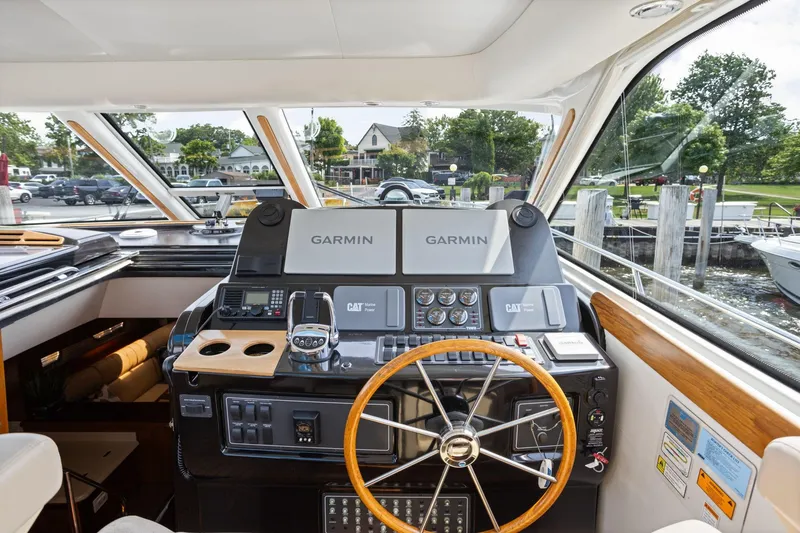 Slide: The Image of Helm of 2003 Tiara Yachts 5200 Sovran with Garmin navigation system. - 16