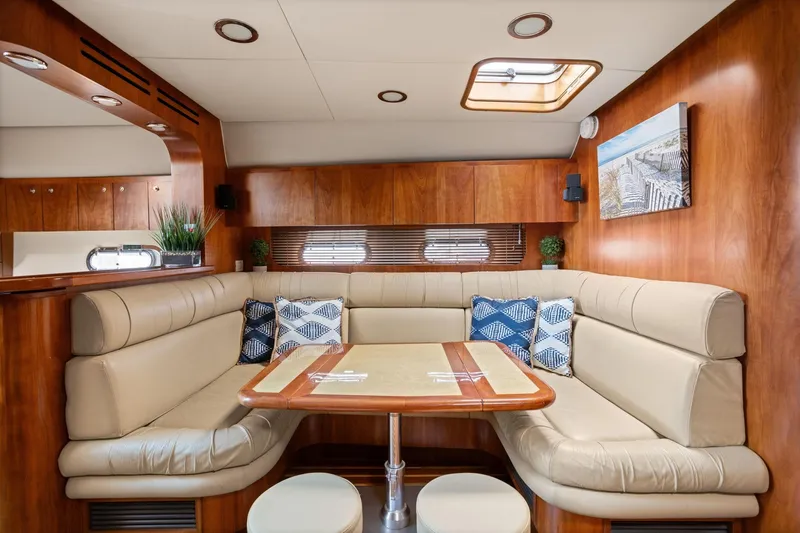 Slide: The Image of Luxurious interior of 2003 Tiara Yachts 5200 Sovran with elegant seating and decor. - 28