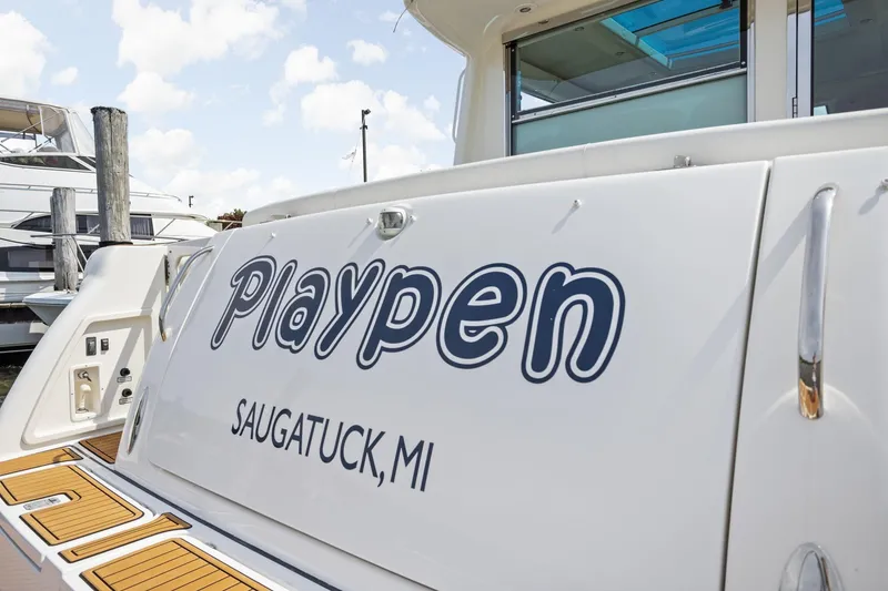 Slide: The Image of 2003 Tiara Yachts 5200 Sovran named "Playpen" docked in Saugatuck, MI. - 9